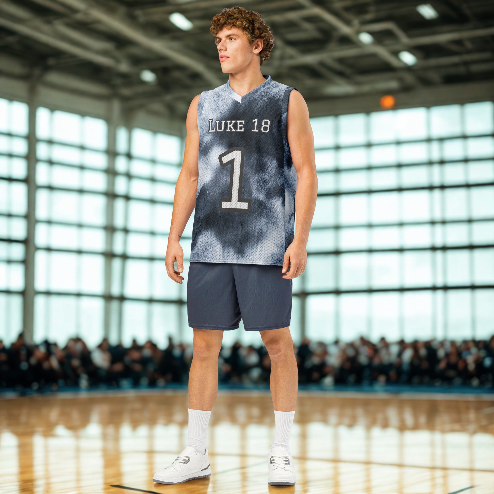 Person wearing a sports jersey with 'LUKE 18' and number '1' on a basketball court.