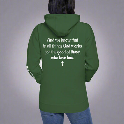 Unisex forest green hoodies with verse praise logo on the front, Romans 8:28 on left sleeve, And we know that in all things God works for the good of those who love him verse with cross